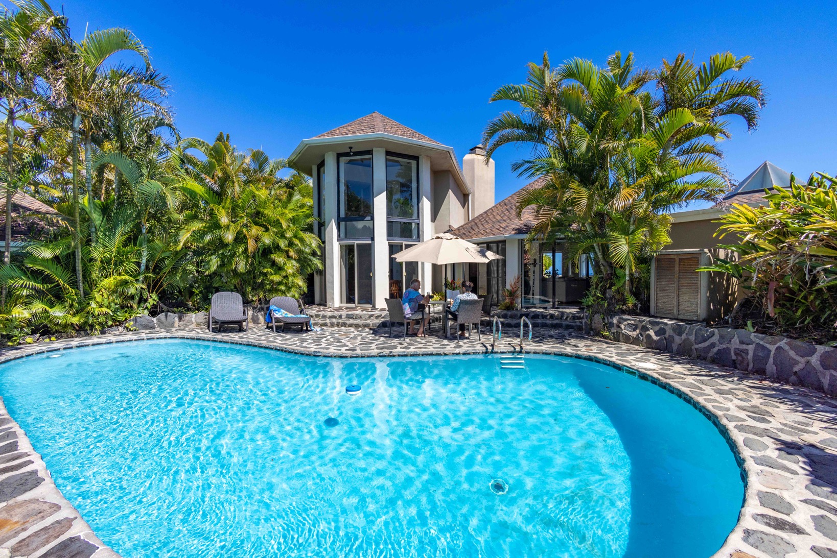 Waterfall House: Private pool w/ lounge chairs & patio dining